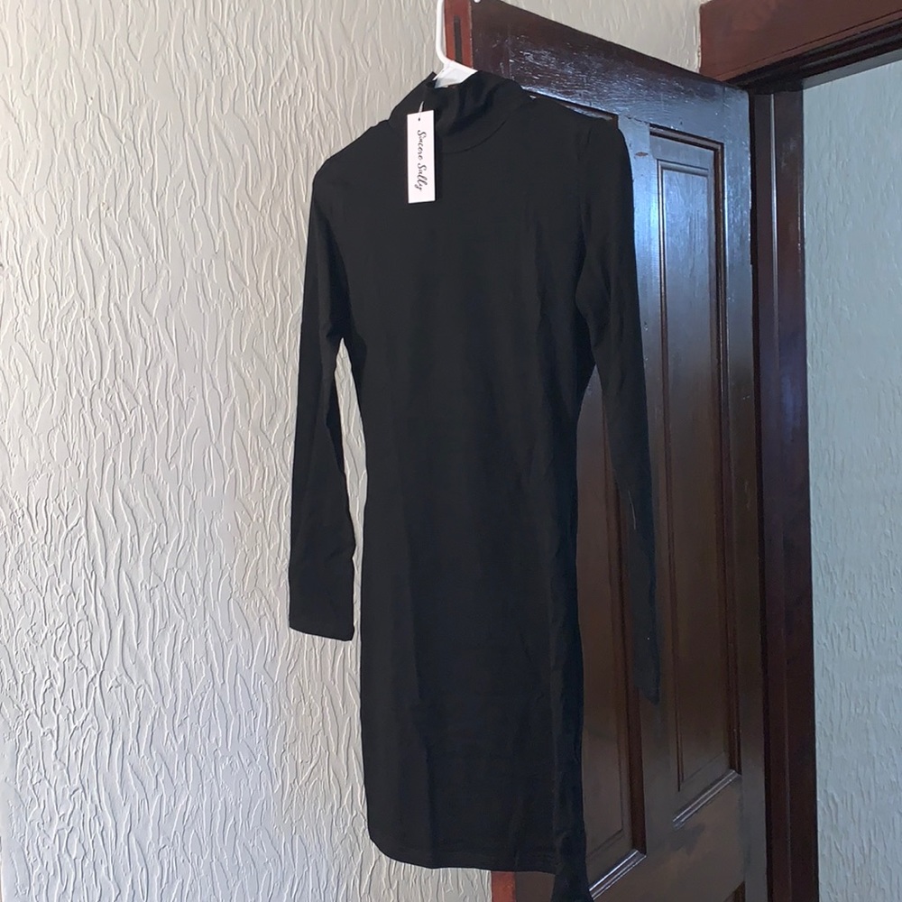 Brand new black turtle neck dress.
